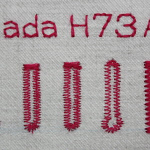 Lada H73A gombíkové dierky, abeceda